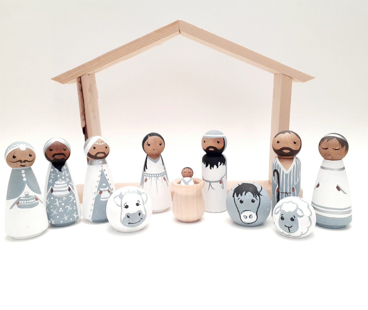 Wooden peg doll nativity scene set 13 pieces in white and grey and silver color palette 